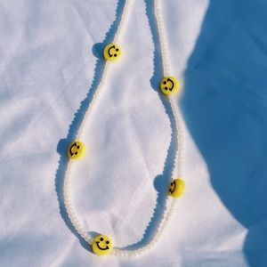 Smiley face bead necklace